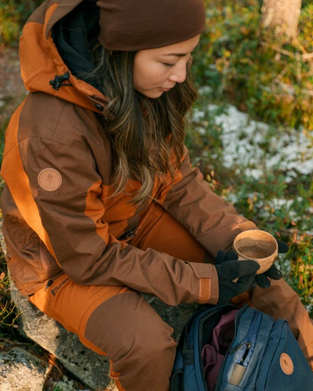 Fudge Nougat Coloured Pinewood Womens Finnveden Hybrid Extreme Jacket on outdoor background 