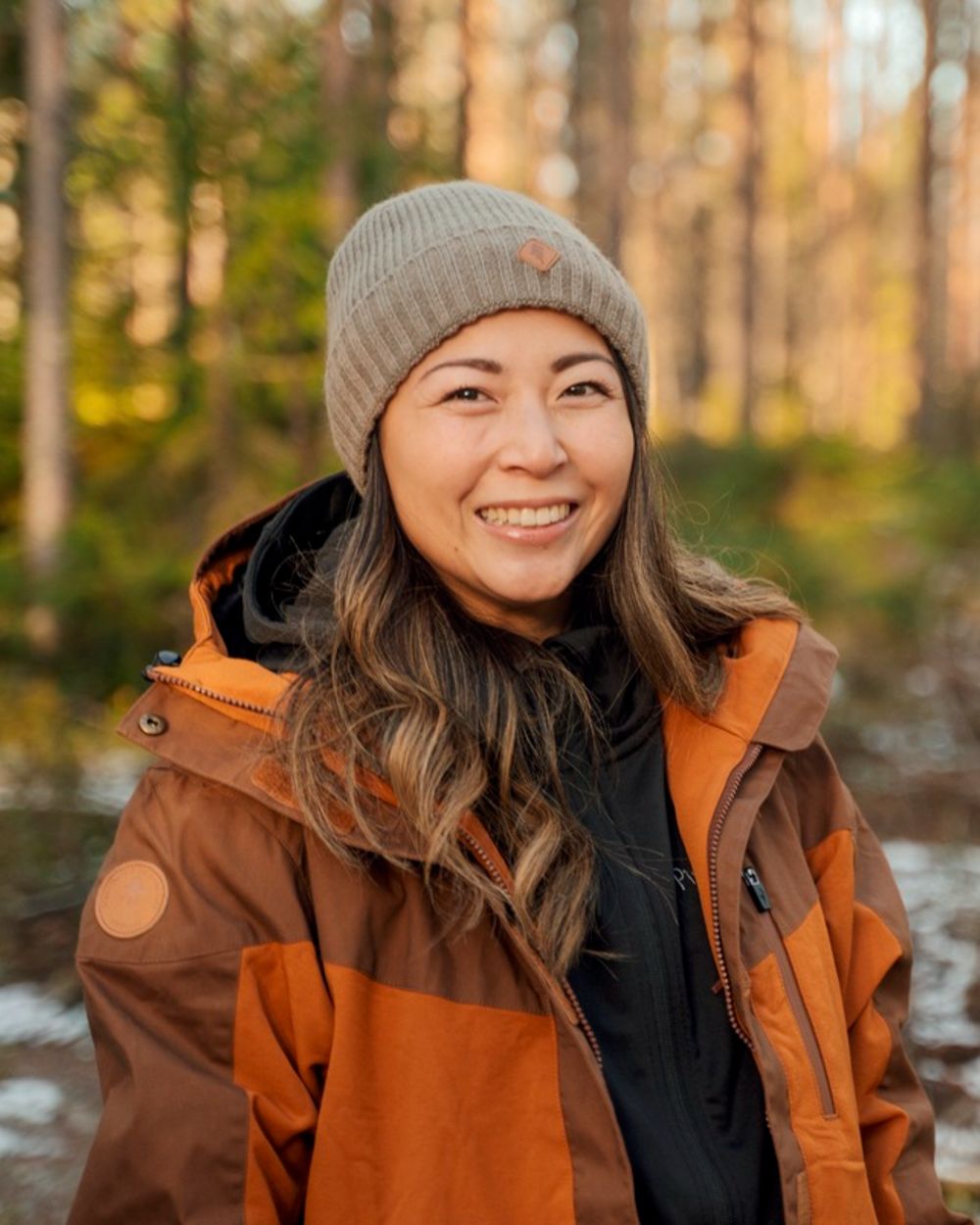 Fudge Nougat Coloured Pinewood Womens Finnveden Hybrid Extreme Jacket on outdoor background 