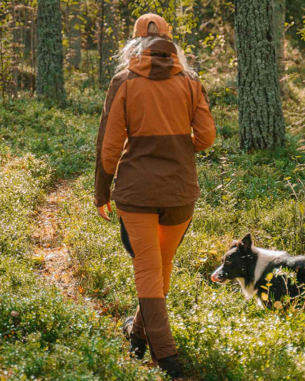 Fudge Nougat Coloured Pinewood Womens Finnveden Hybrid Jacket on outdoor background 