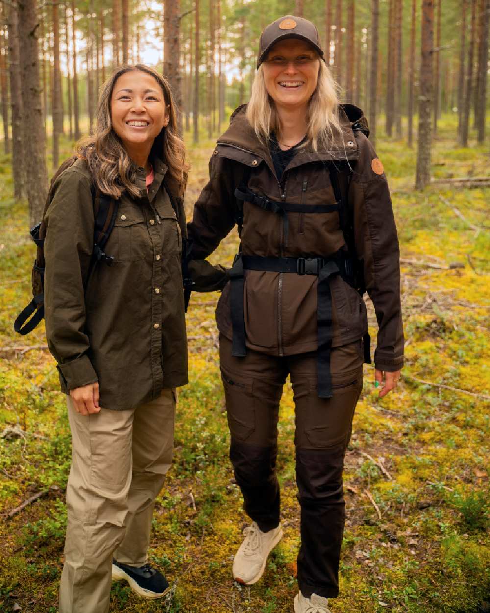 Dark Brown Coloured Pinewood Womens Finnveden Hybrid Trousers on outdoor background 