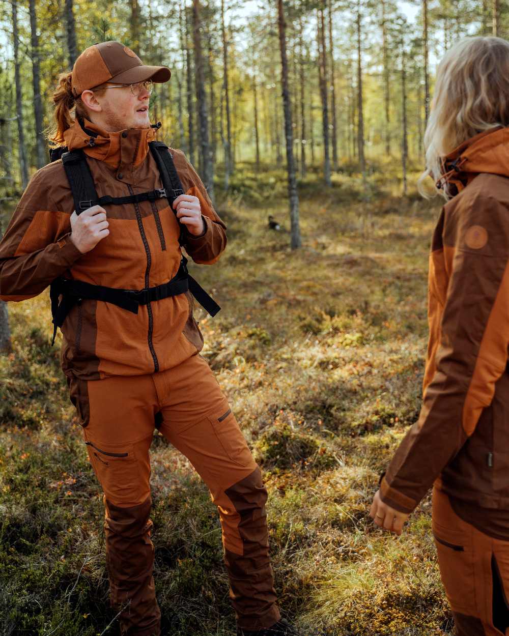 Fudge Nougat Coloured Pinewood Womens Finnveden Hybrid Trousers on outdoor background 