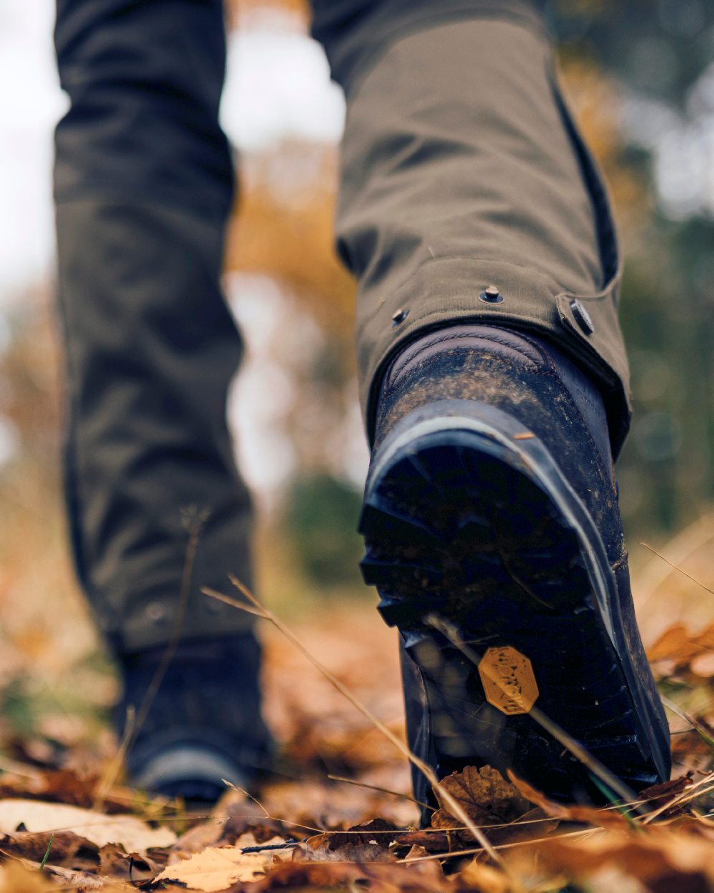 Mid Green Dark Anthracite Coloured Pinewood Womens Finnveden Hybrid Trousers on outdoor background 