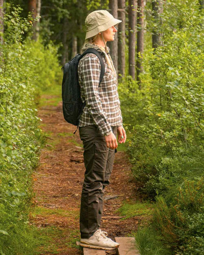 Dark Olive Coloured Pinewood Womens Finnveden Outdoor Trousers on outdoor background 