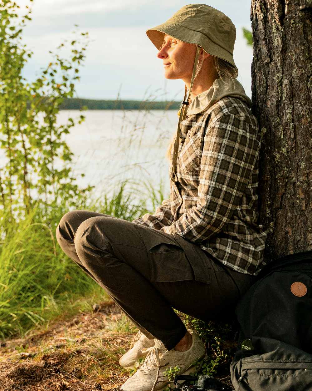 Dark Olive Coloured Pinewood Womens Finnveden Outdoor Trousers on outdoor background 