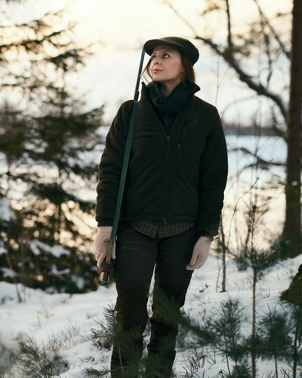 Green Suede Brown Coloured Pinewood Womens Harriette Padded Fleece Jacket on snow background 