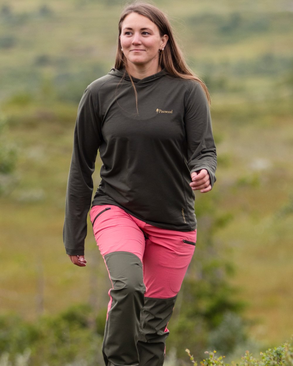 Moss Green coloured Pinewood Womens Insectsafe Function Hoodie on mountain background 