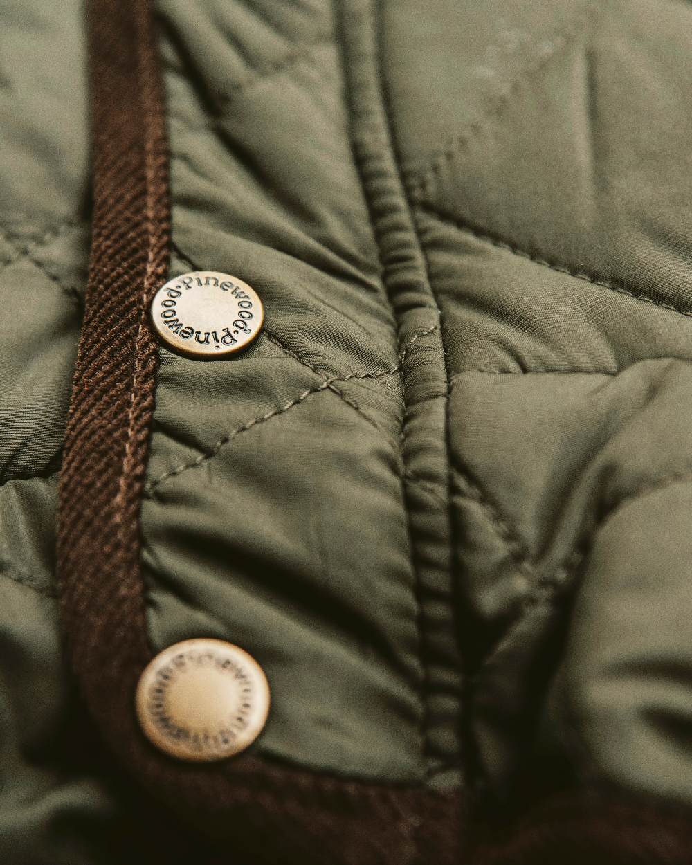 Moss Green Coloured Pinewood Womens Nydala Classic Quilt Jacket on outdoor background 