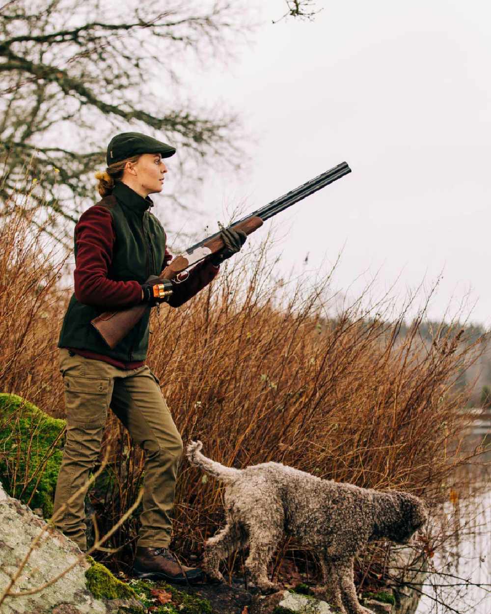 Burgundy Suede Brown coloured Pinewood Womens Nydala Fleece Jacket on lake background 