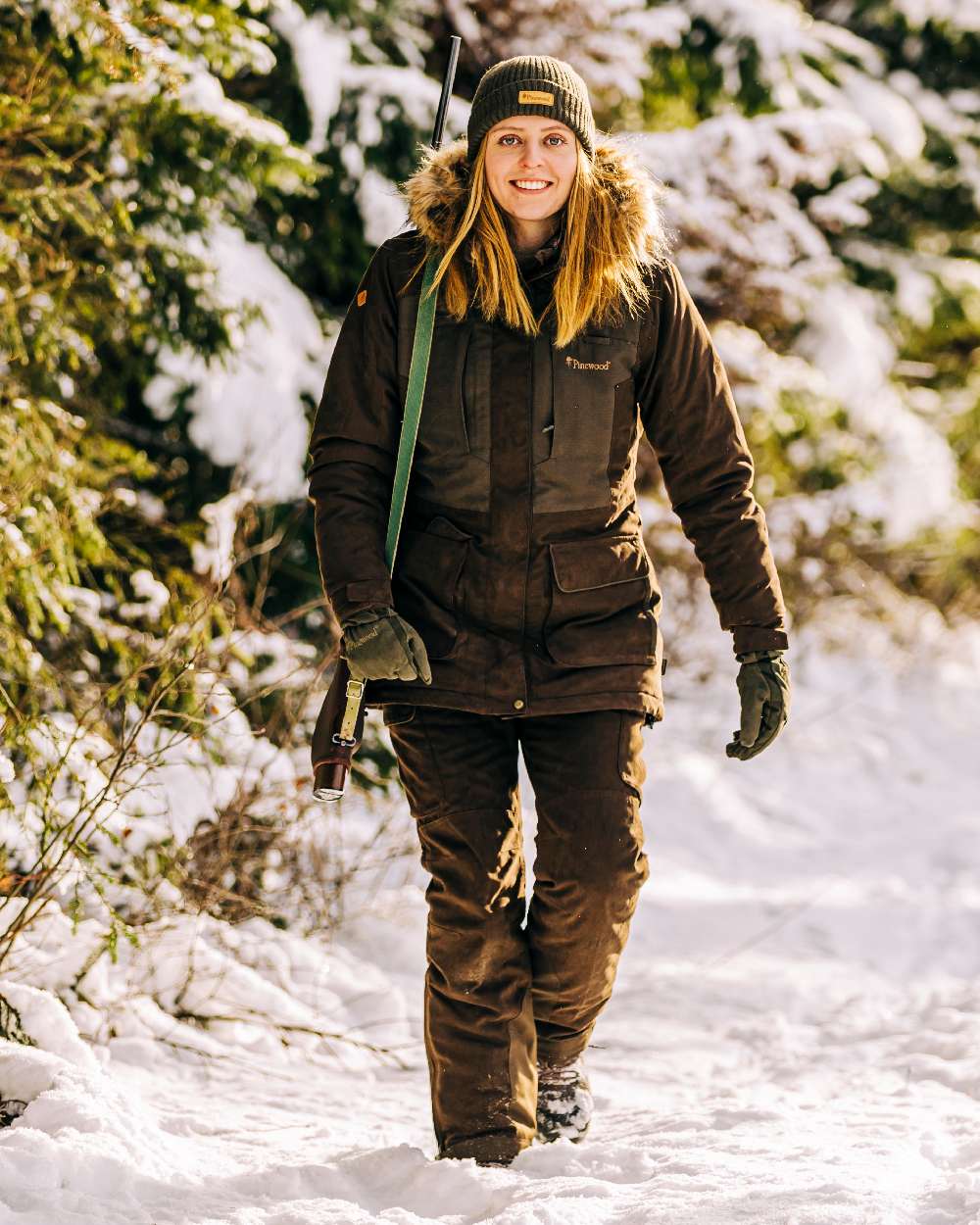 Suede Brown Coloured Pinewood Womens Smaland Abisko 2.0 Hunting Jacket on snow background 