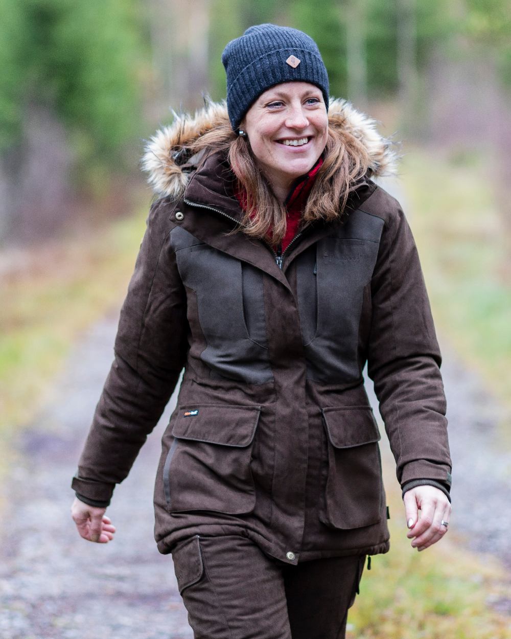 Suede Brown Coloured Pinewood Womens Smaland Abisko 2.0 Hunting Jacket on forest background 