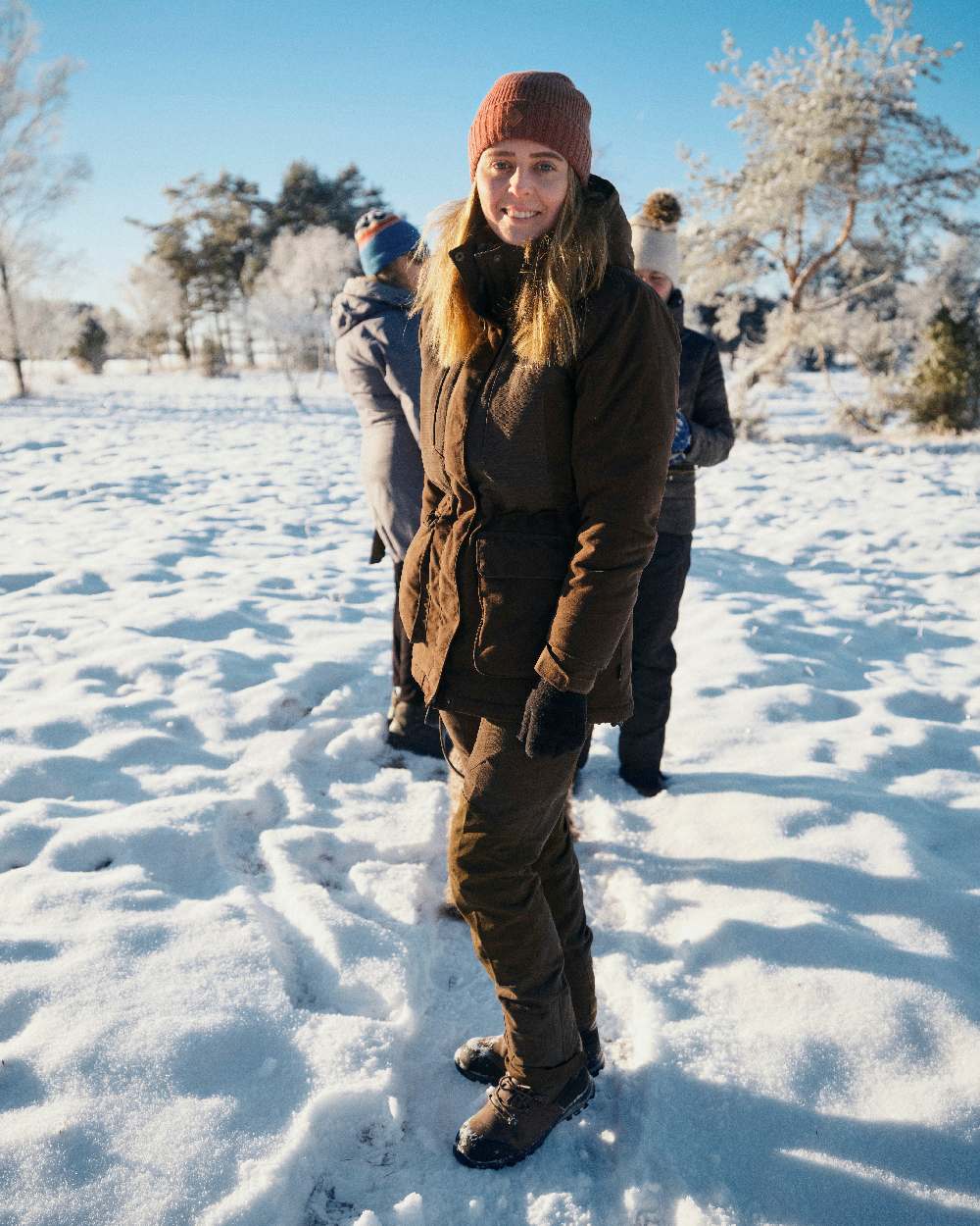 Suede Brown Coloured Pinewood Womens Smaland Abisko 2.0 Hunting Jacket on snow background 