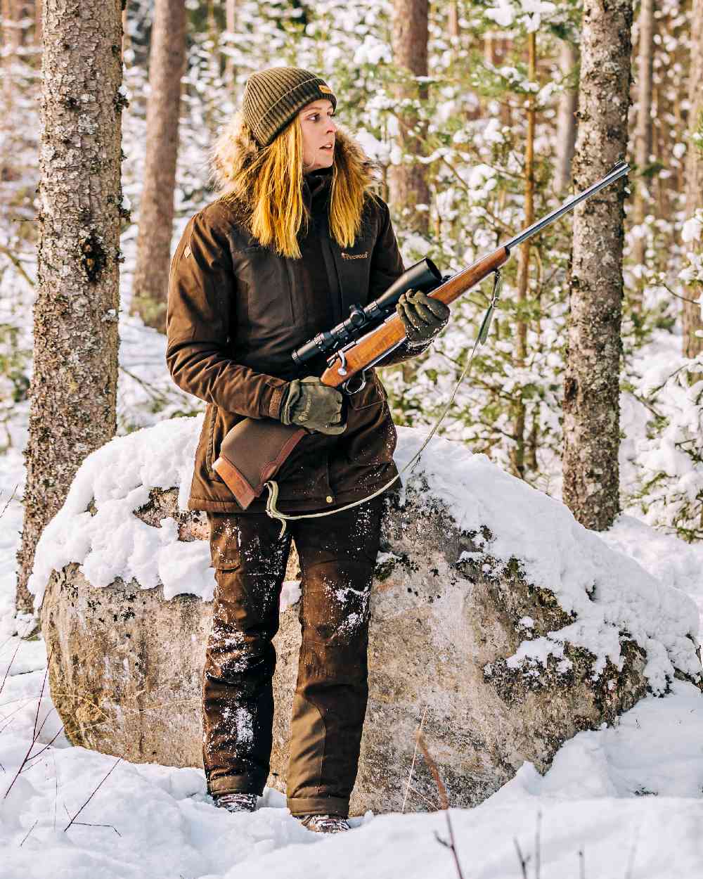 Suede Brown Coloured Pinewood Womens Smaland Abisko 2.0 Hunting Jacket on snow background 
