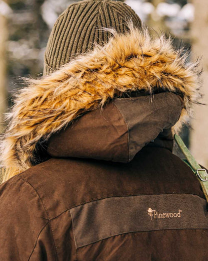 Suede Brown Coloured Pinewood Womens Smaland Abisko 2.0 Hunting Jacket on snow background 