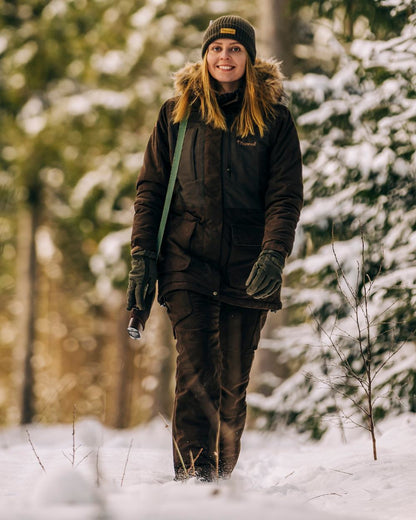 Suede Brown Coloured Pinewood Womens Smaland Abisko 2.0 Hunting Jacket on snow background 