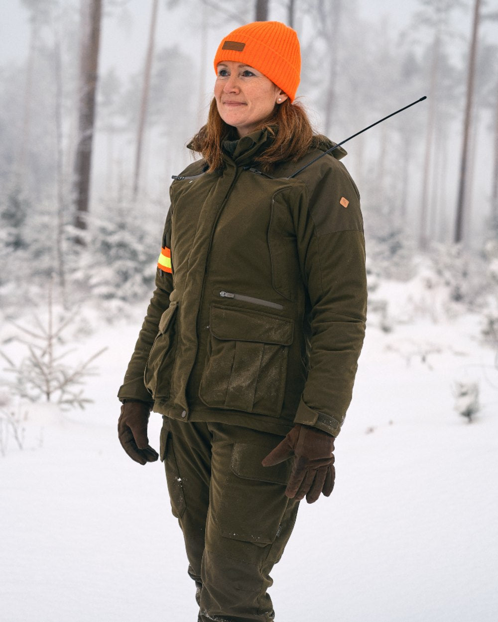 Hunting Green coloured Pinewood Womens Smaland Forest Padded Jacket on snow background 