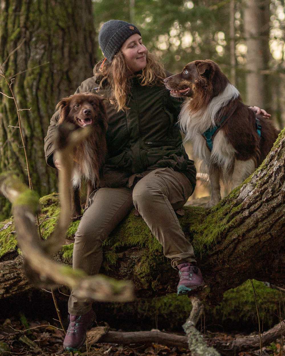 Hunting Green coloured Pinewood Womens Smaland Forest Padded Jacket on forest background 
