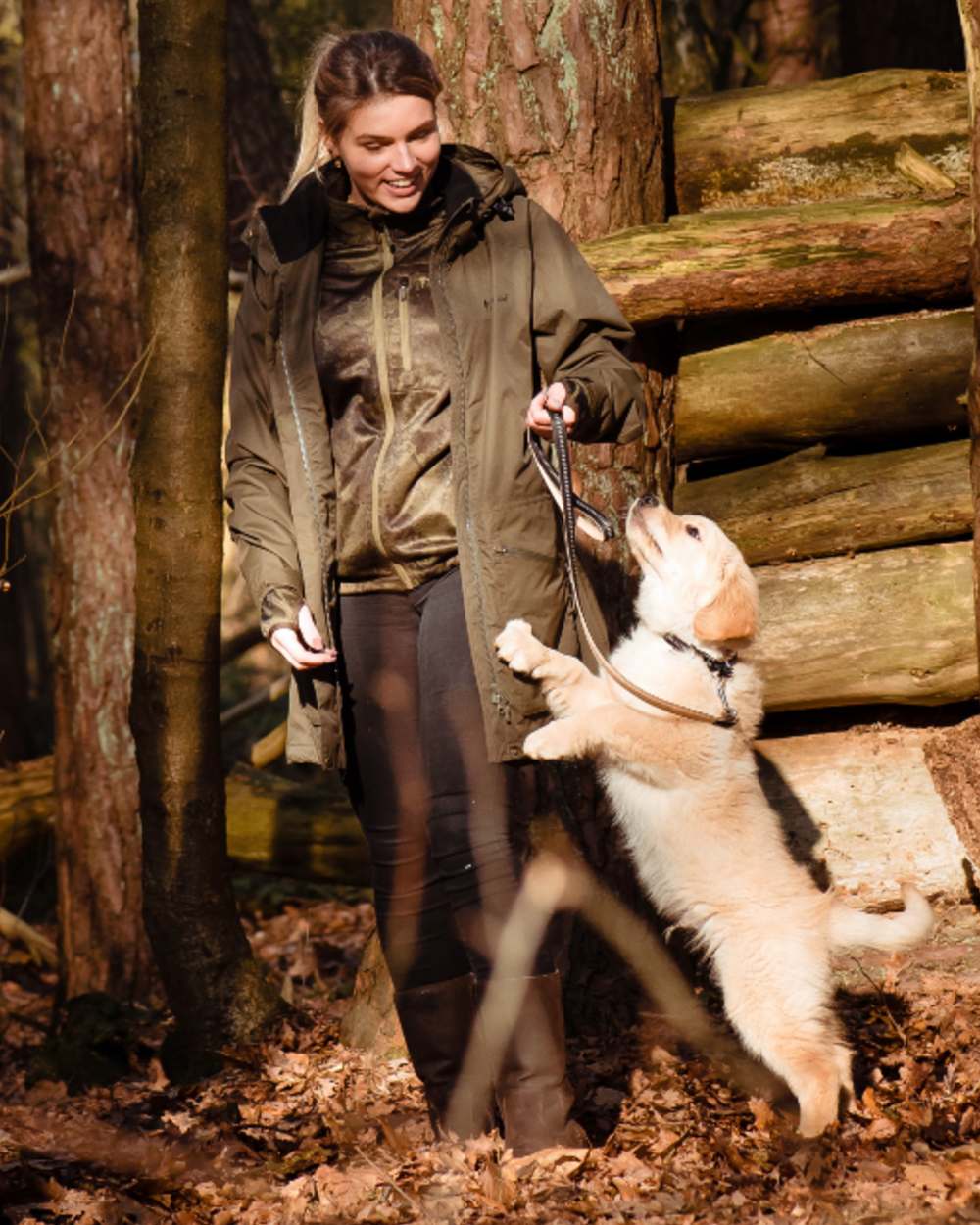 Moss Green coloured Pinewood Womens Wilda Parka on forest background 