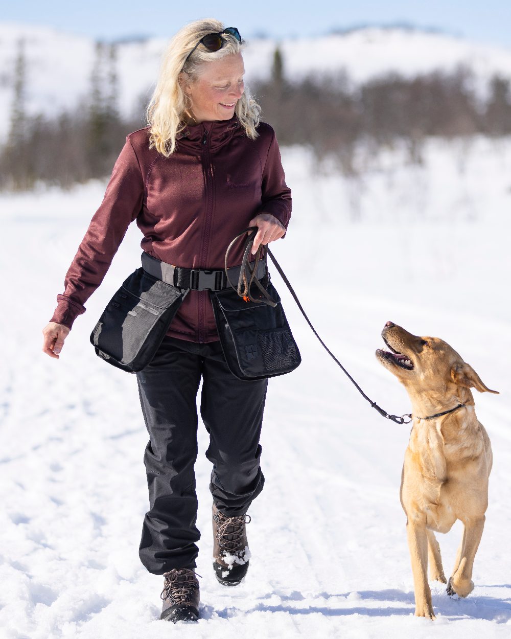 Black Coloured Pinewood Womens Wilda Stretch Shell Trousers on outdoor background 