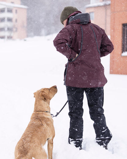 Black Coloured Pinewood Womens Wilda Stretch Shell Trousers on outdoor background 