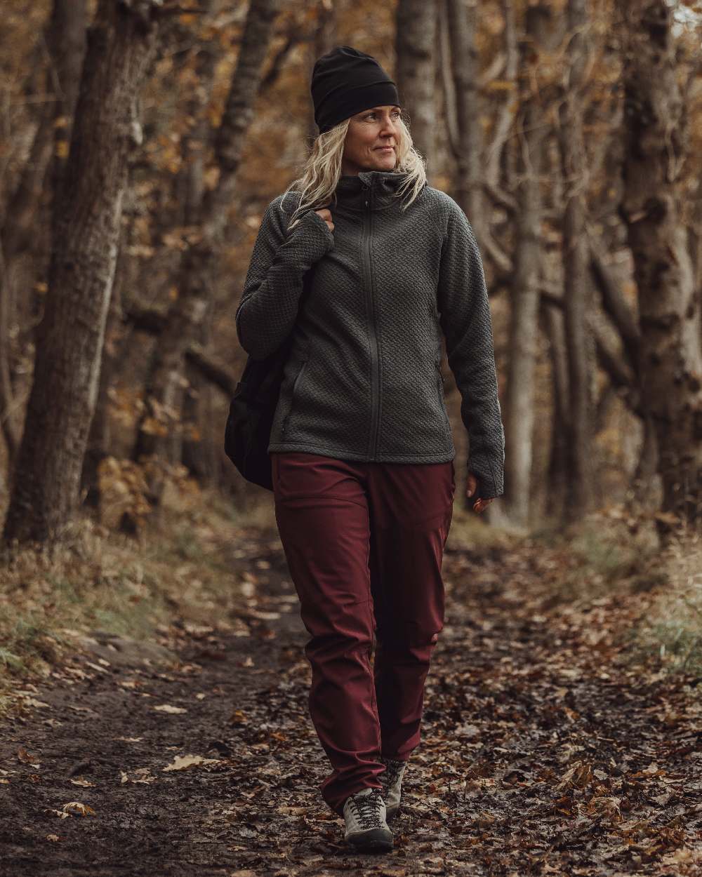 Earth Plum Coloured Pinewood Womens Wilda Stretch Shell Trousers on outdoor background 