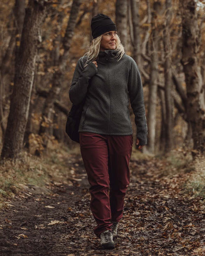 Earth Plum Coloured Pinewood Womens Wilda Stretch Shell Trousers on outdoor background 