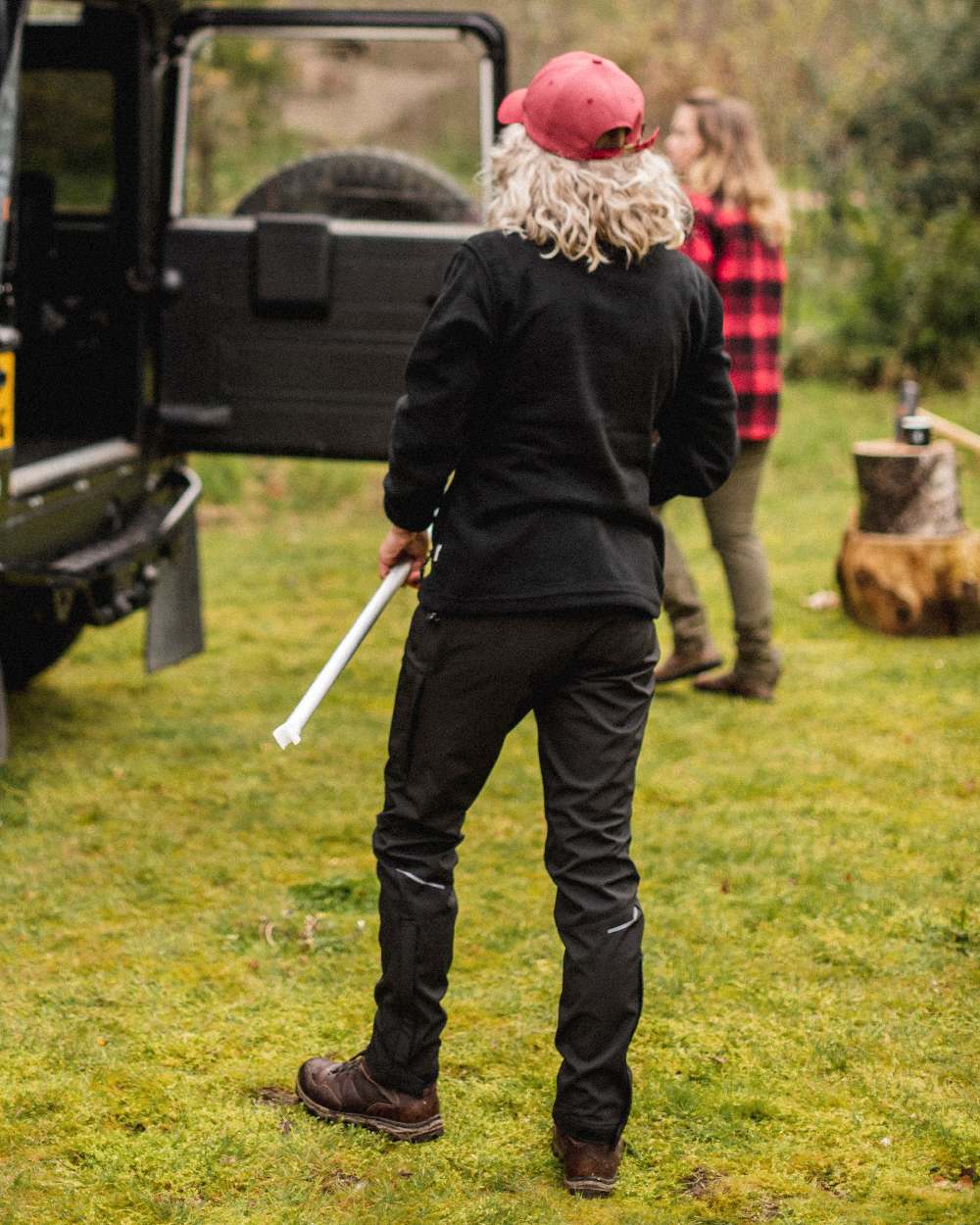 Moss Green Coloured Pinewood Womens Wilda Stretch Shell Trousers on outdoor background 