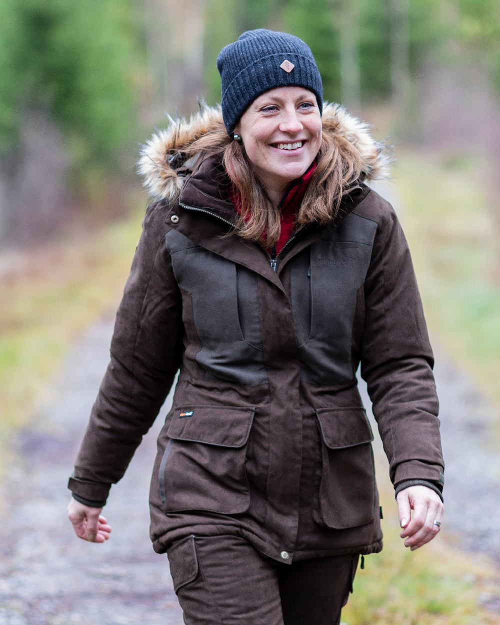 Dark Anthracite Mel Coloured Pinewood Wool Knitted Hat on outdoor background 