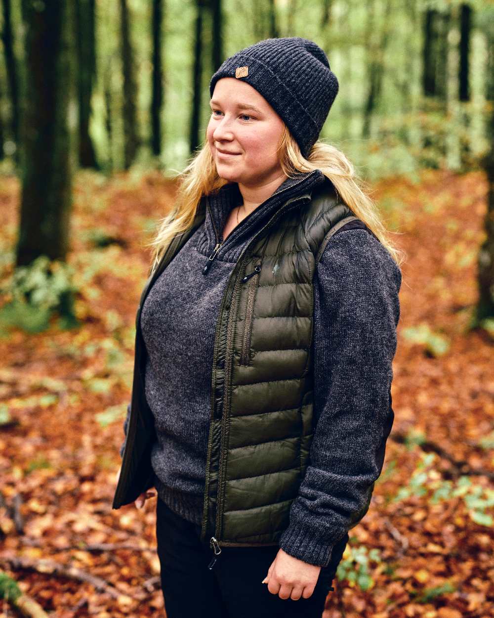 Dark Anthracite Mel Coloured Pinewood Wool Knitted Hat on outdoor background 
