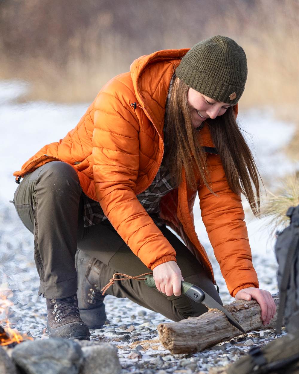 Mossgreen Mel Coloured Pinewood Wool Knitted Hat on outdoor background 