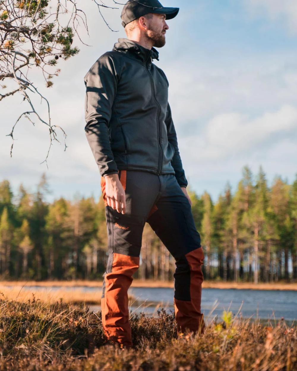Dark Anthracite Terraco coloured Pinewood Mens Finnveden Hybrid Trousers on outdoor background 