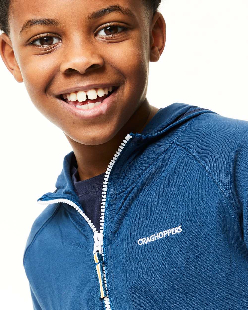 Poseidon Blue Coloured Craghoppers Childrens NosiLife Symmons Hooded Jacket On A White Background 