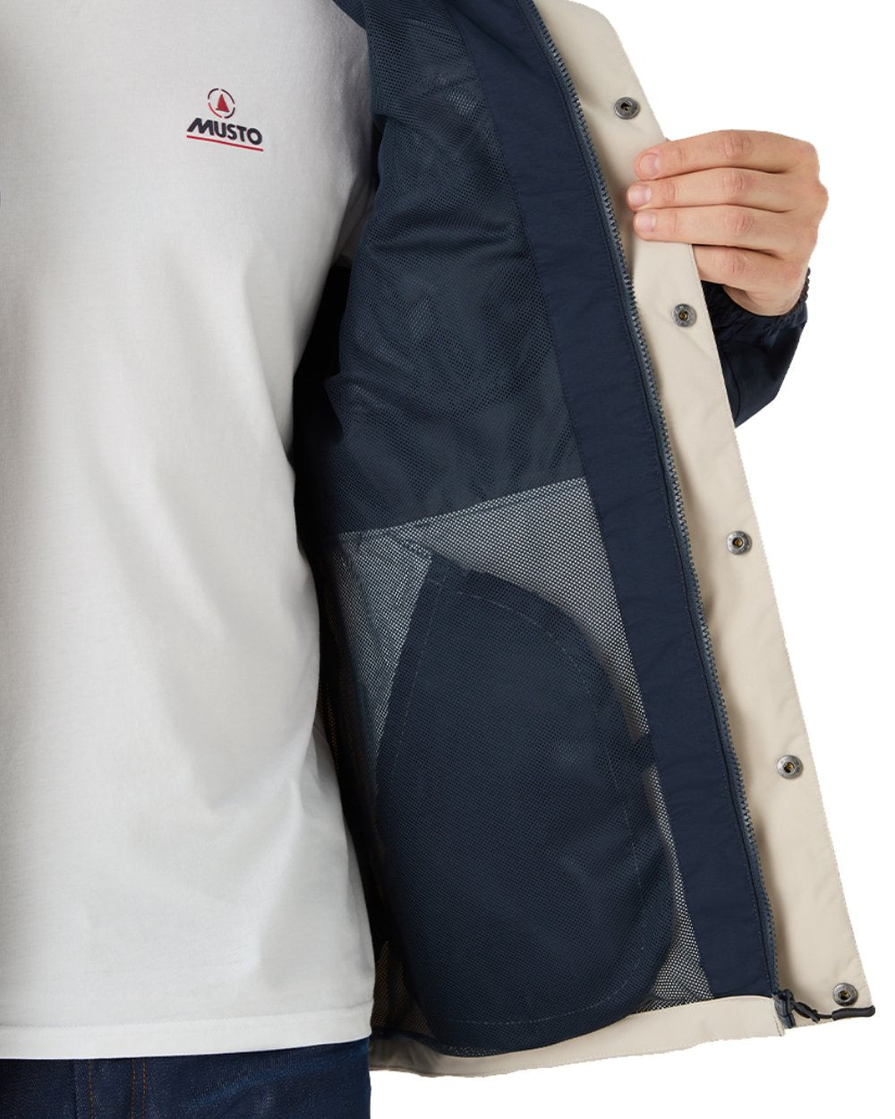 Pumice/Navy Coloured Musto Mens Classic Shore Waterproof Jacket On A White Background 