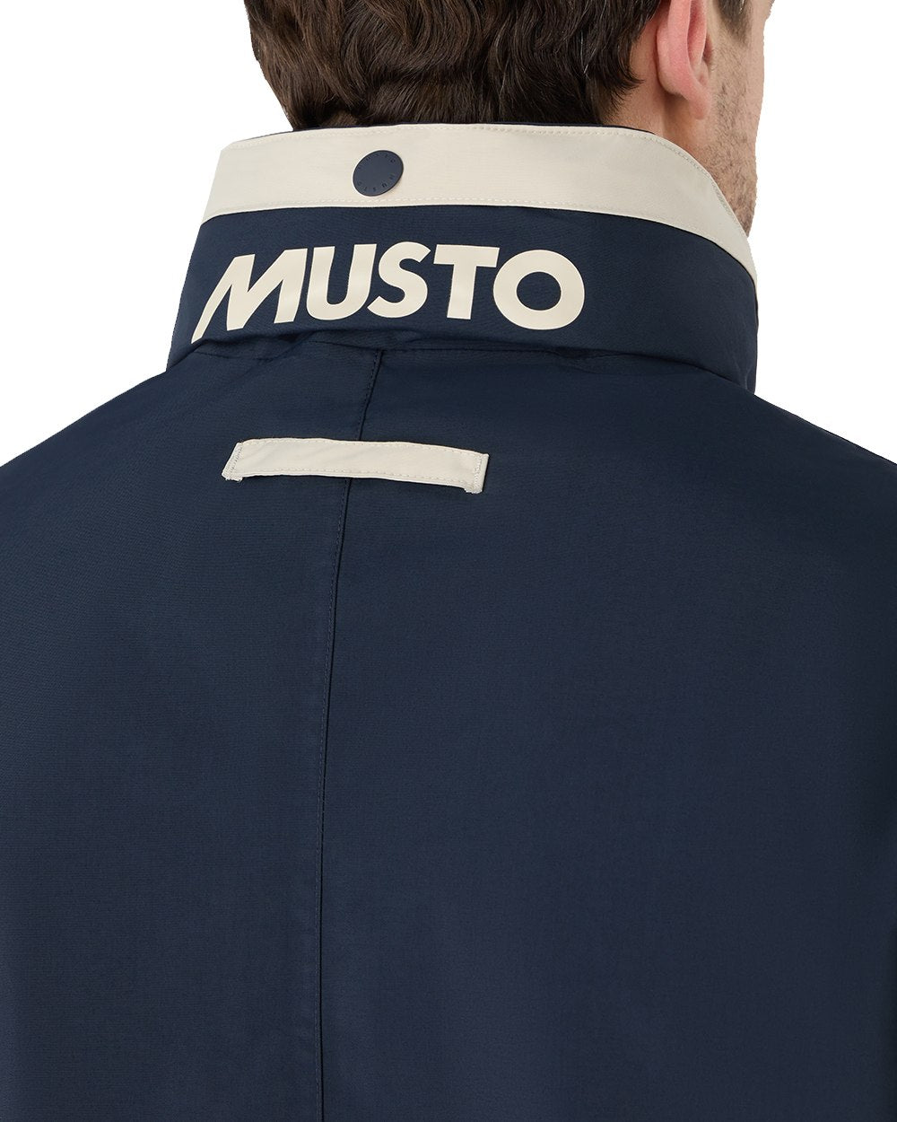 Pumice/Navy Coloured Musto Mens Classic Shore Waterproof Jacket On A White Background 