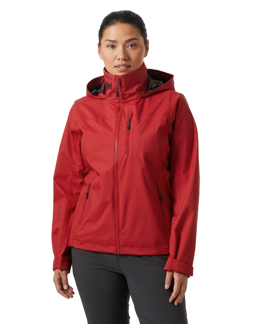 Red coloured Helly Hansen womens crew hooded sailing jacket 2.0 on white background 