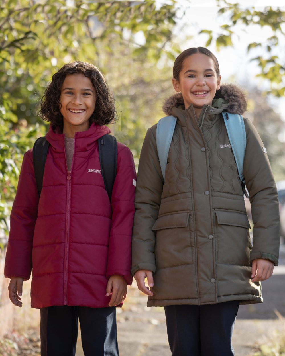 Dark Pimento Coloured Regatta Childrens Halkner Quilted Jacket on outdoor background 