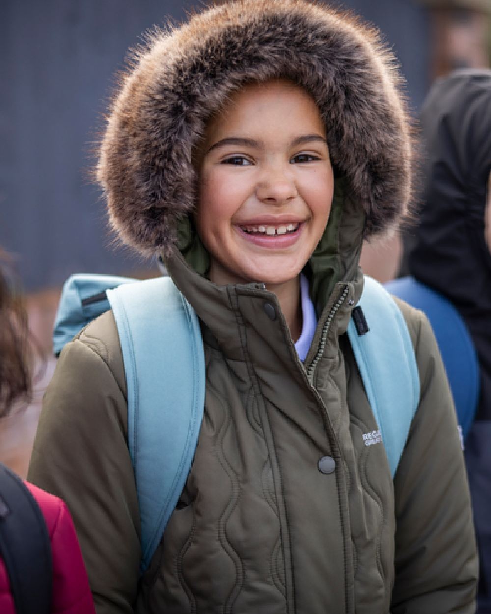 Green Coloured Regatta Childrens Halkner Quilted Jacket on outdoor background 