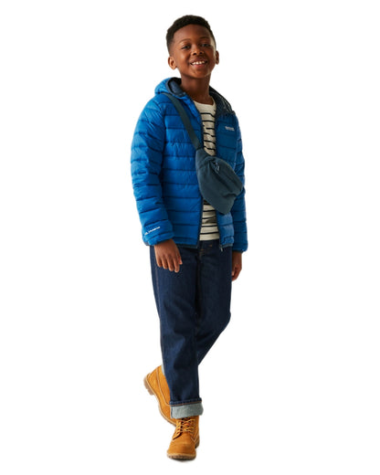 Snorkel Blue Moonlight Denim Coloured Regatta Childrens Hooded Marizion Padded Jacket on white background 