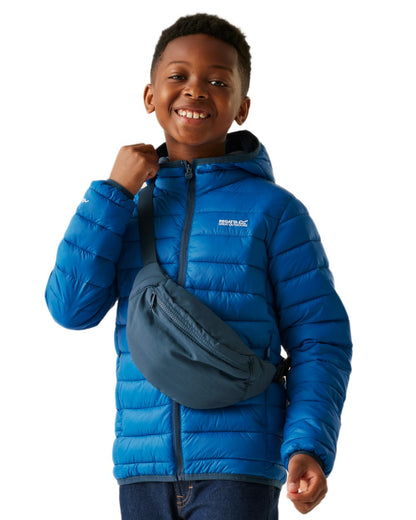 Snorkel Blue Moonlight Denim Coloured Regatta Childrens Hooded Marizion Padded Jacket on white background 