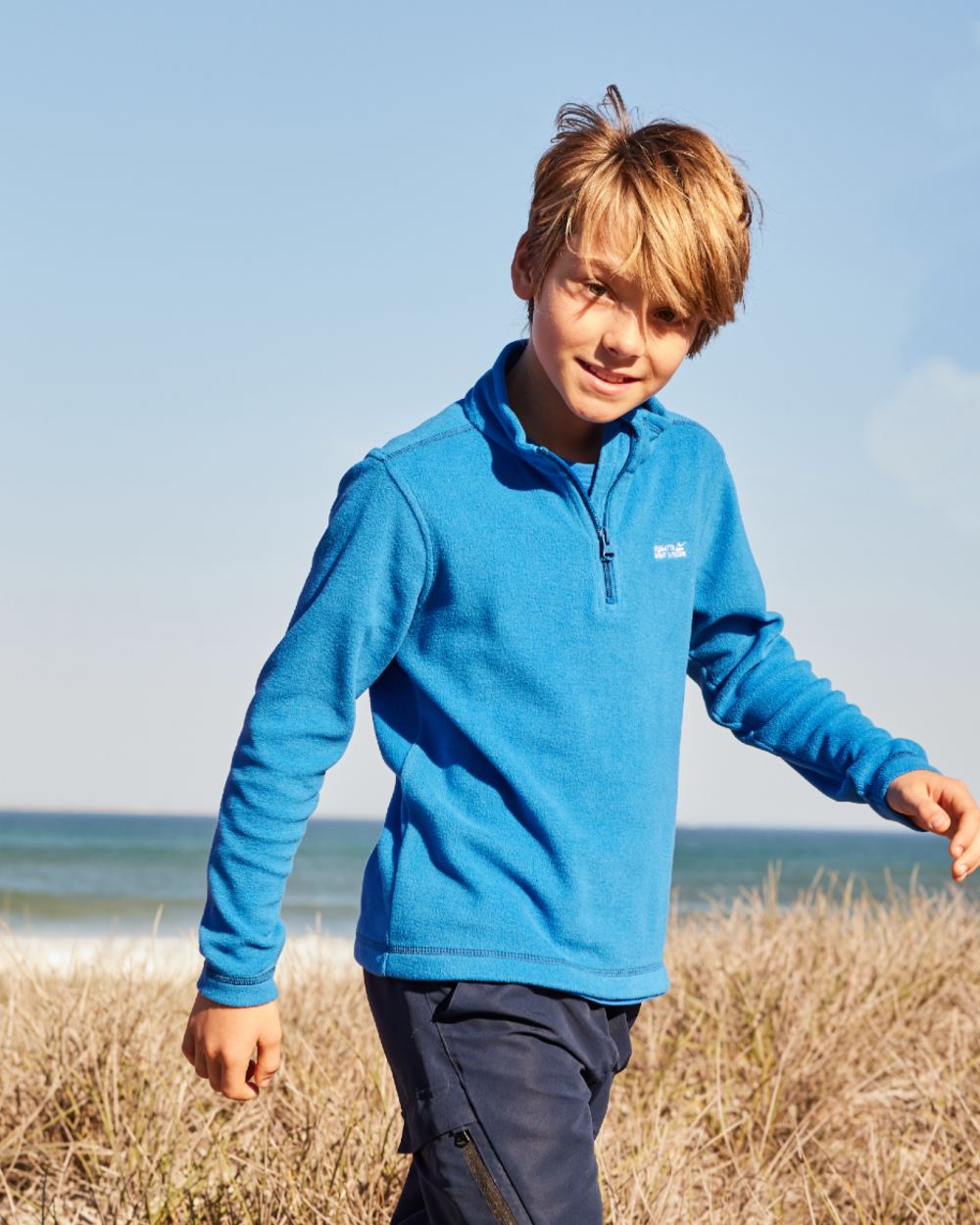 Oxford Blue Navy Coloured Regatta Childrens Hot Shot II Half Zip Fleece Sweater on outdoor background 