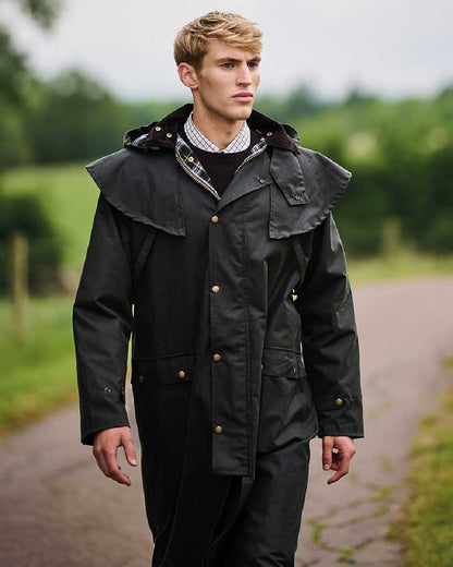 Dark Khaki coloured Regatta Cranbrook Wax Jacket on blurry background 