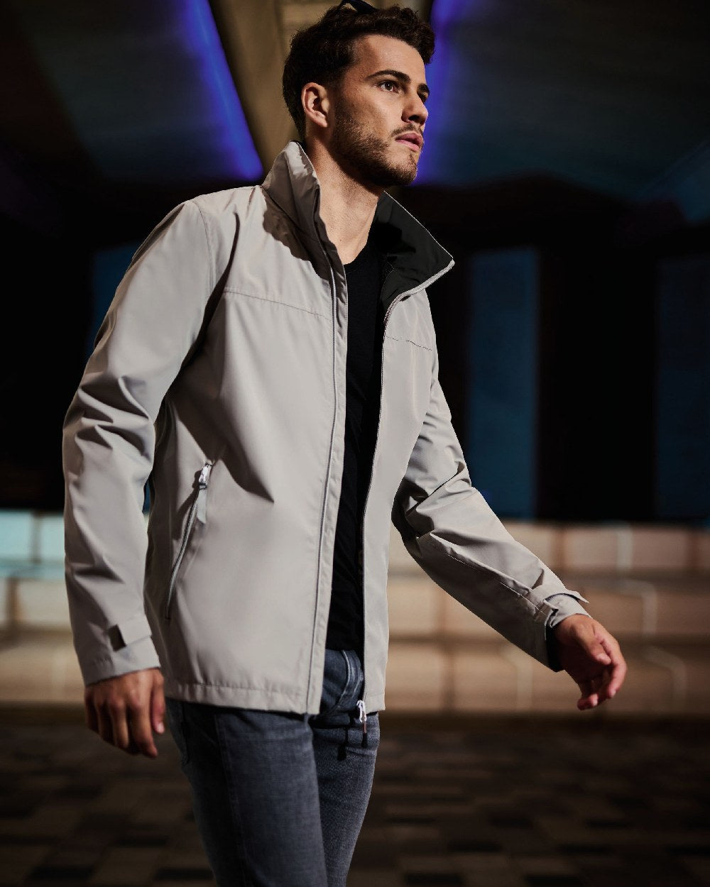 Mineral Grey Black coloured Regatta Mens Ascender Waterproof Shell Jacket on blurry background 