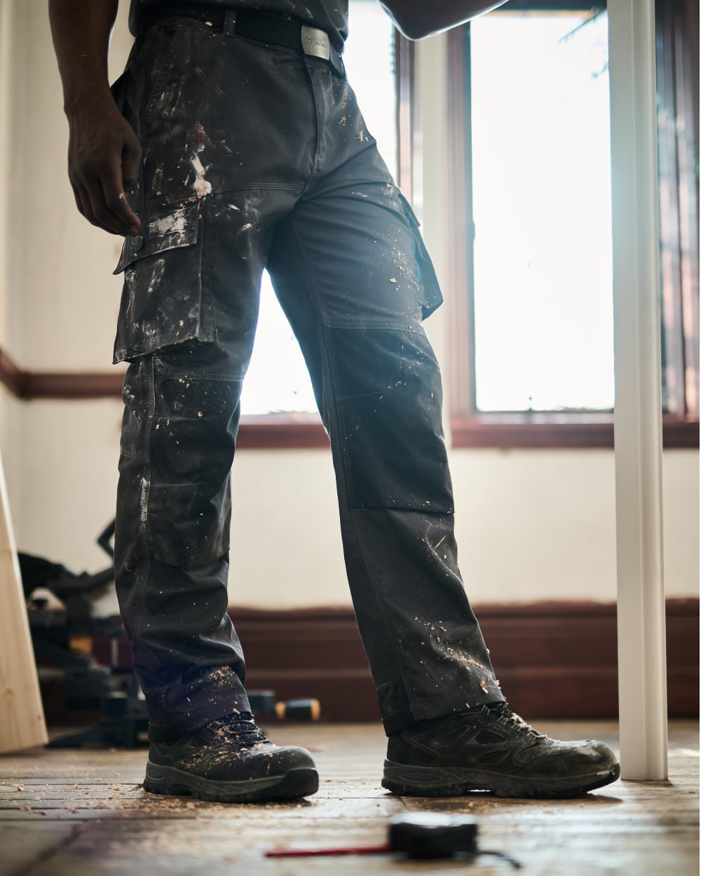 Iron coloured Regatta Mens Heroic Worker Trousers on blurry background 