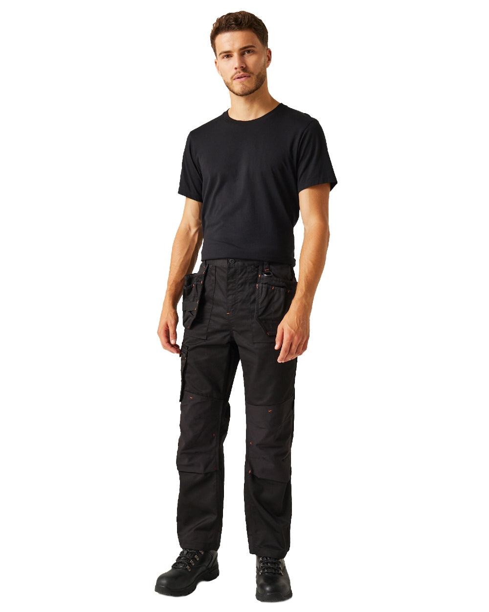 Black coloured Regatta Mens Incursion Work Trousers on white background 