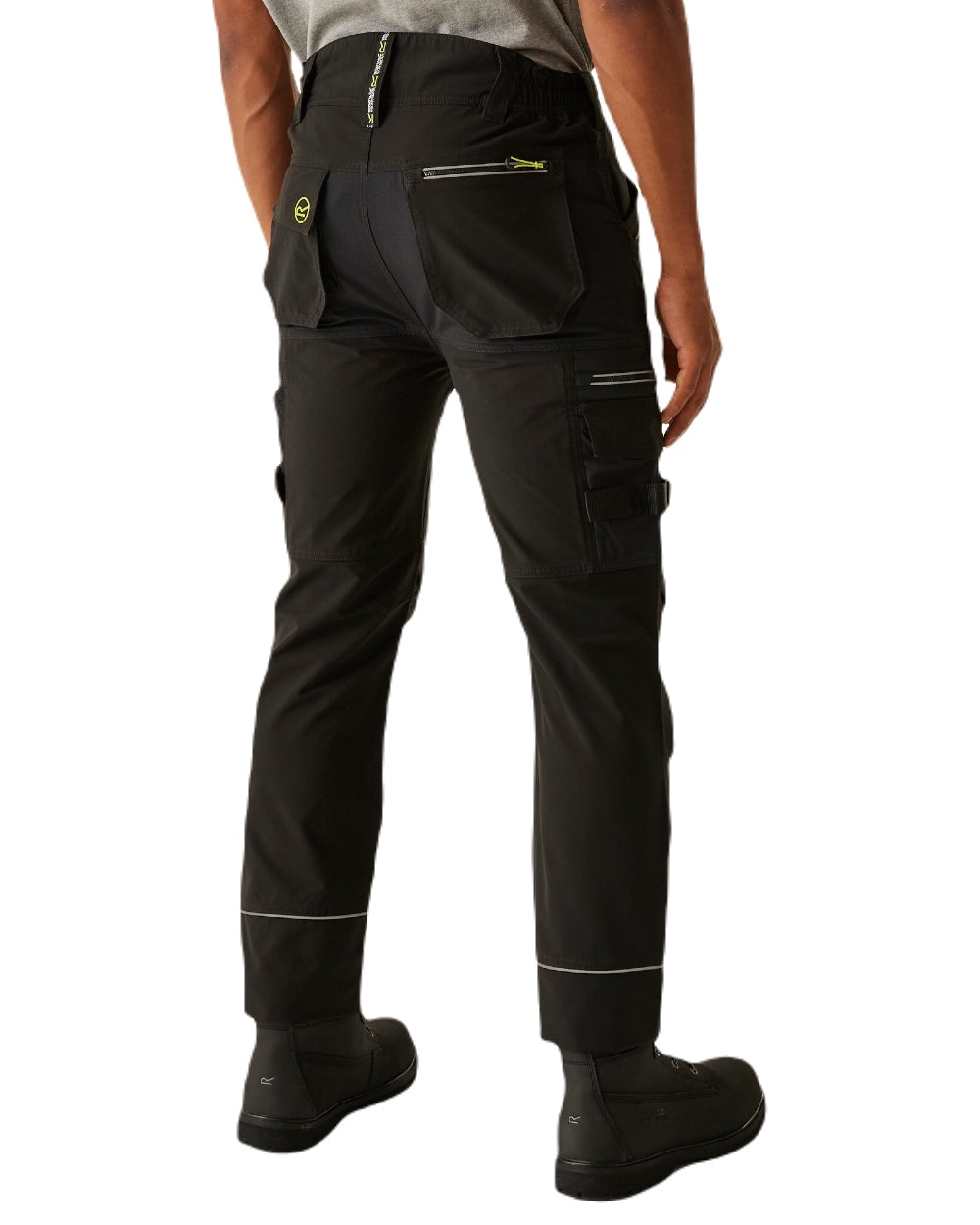 Black coloured Regatta Mens Infiltrate Softshell Stretch Trousers on white background 