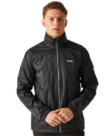 Black Coloured Regatta Mens Lyle IV Waterproof Packaway Jacket on white background 