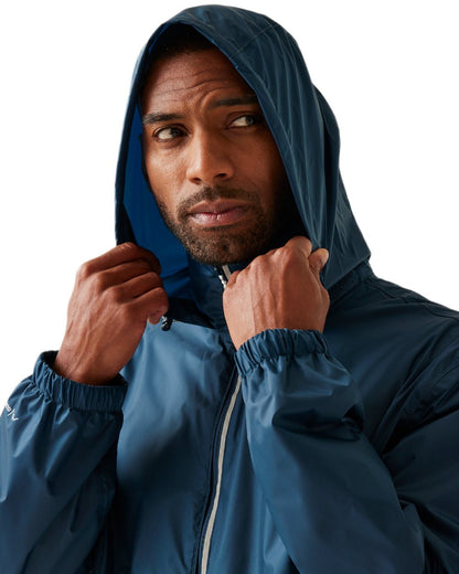 Moonlight Denim Tangerine Tango Coloured Regatta Mens Lyle IV Waterproof Packaway Jacket on white background 