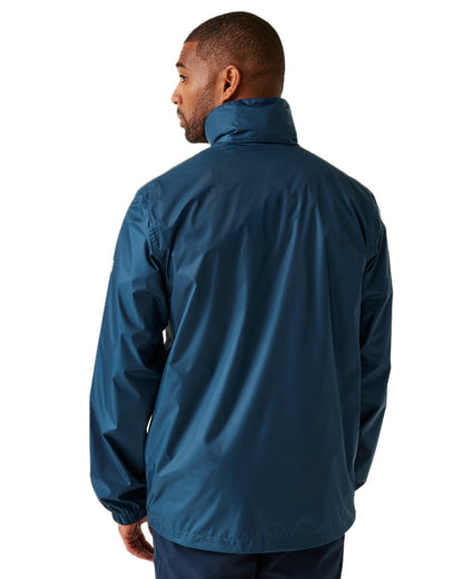 Moonlight Denim Tangerine Tango Coloured Regatta Mens Lyle IV Waterproof Packaway Jacket on white background 