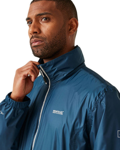 Moonlight Denim Tangerine Tango Coloured Regatta Mens Lyle IV Waterproof Packaway Jacket on white background 