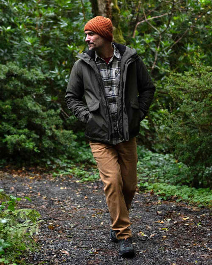 Dark Khaki Coloured Regatta Mens Sterlings Waterproof Insulated Jacket on forest background 