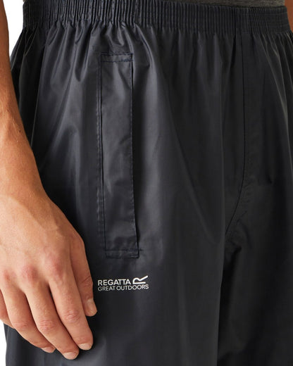 Navy Coloured Regatta Mens Stormbreak Waterproof Overtrousers on white background 